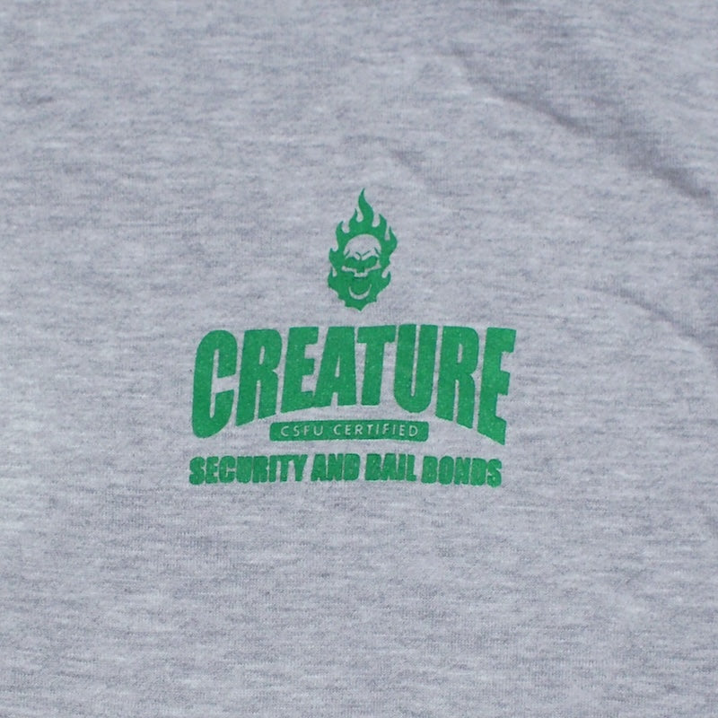 CREATURE ジップパーカー SECURITY SERVICE ZIP HOODIE グレー 商品画像 フロントプリント